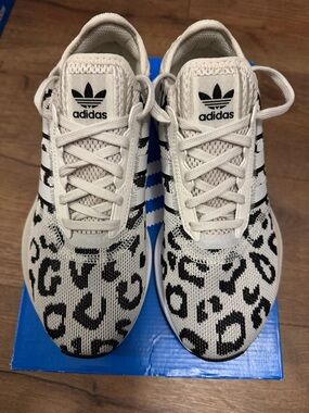 adidas• Swift Run White and Black Leopard Knit Athletic Sneakers